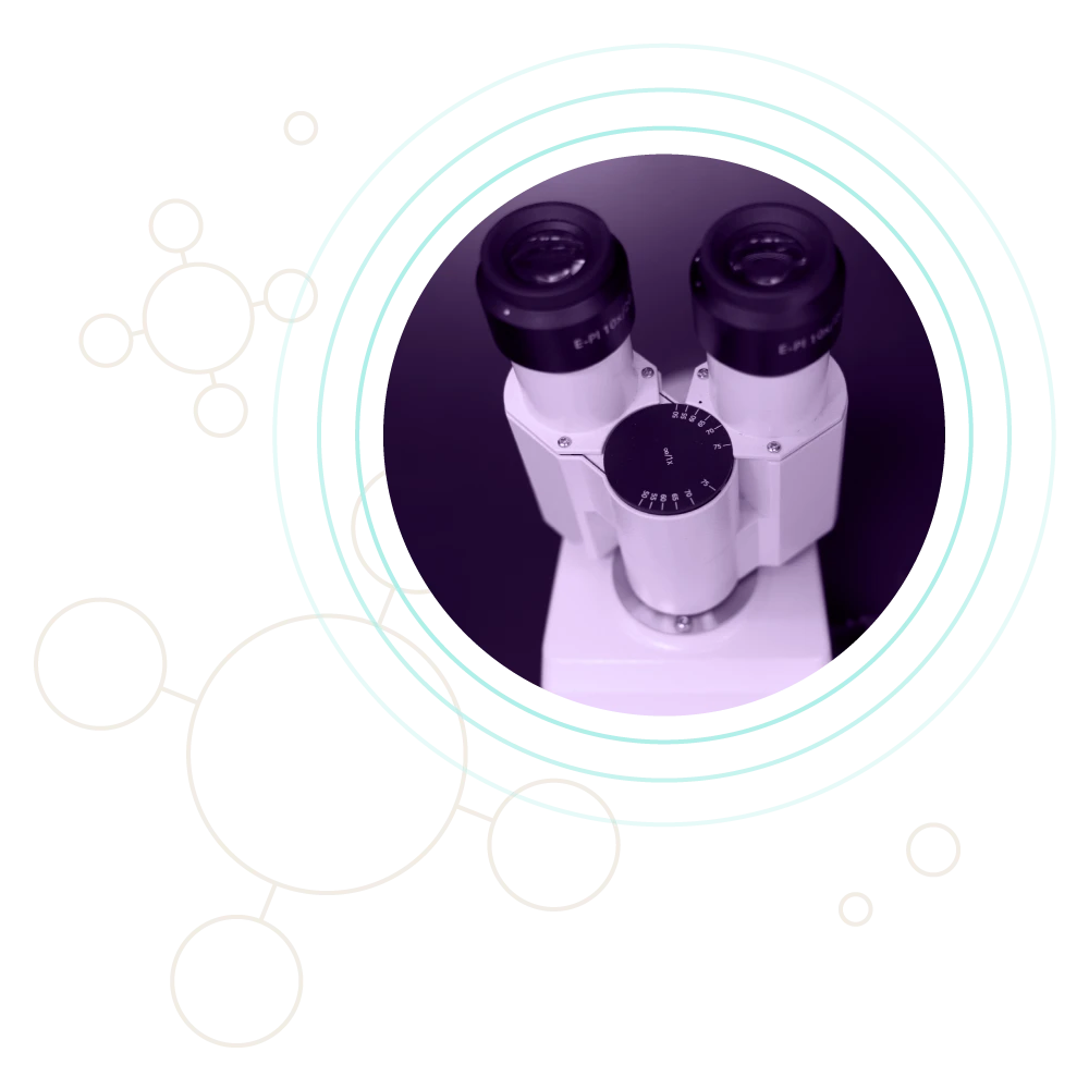 Circular line illustrations highlighting a microscope eyepiece.
